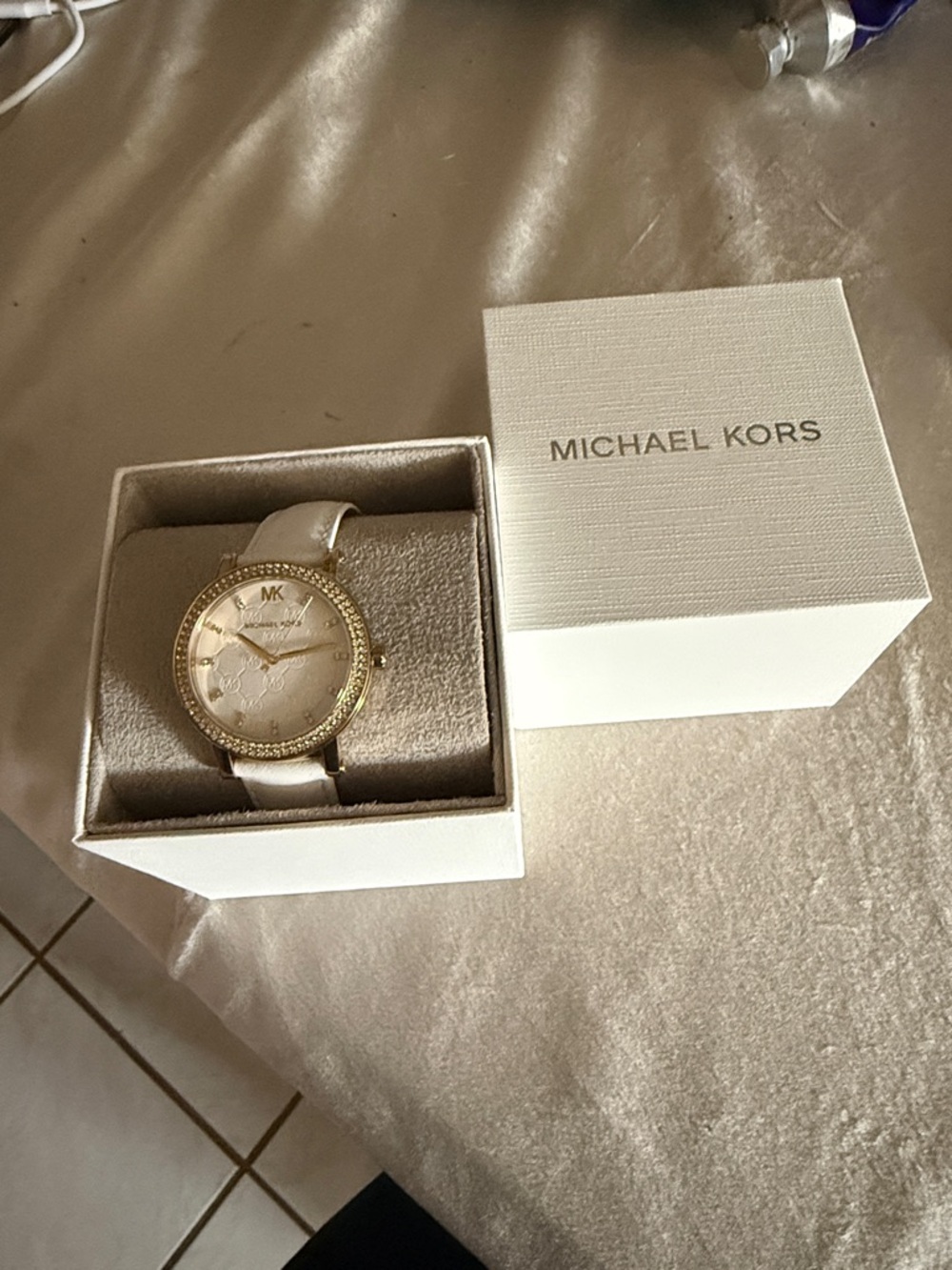 Michael Kors Gold-Tone Crystal Bezel Watch with White Leather Strap